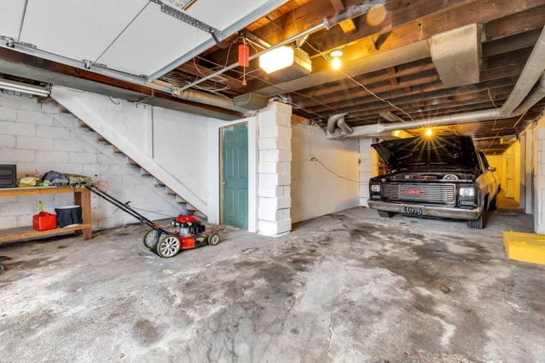 This garage at College Hill Annex is 13X28 ft with 8 ft door. Basement, accessed through door includes laundry facilities.