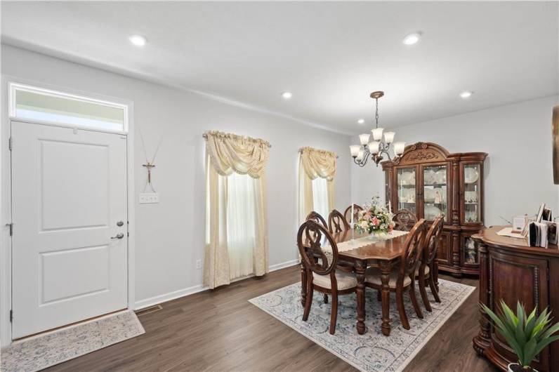 Entryway leads to the formal dining space.