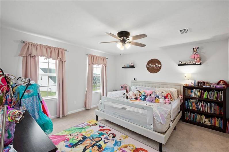Bedroom two is lovely with two large windows, plush carpeting and a walk in closet.