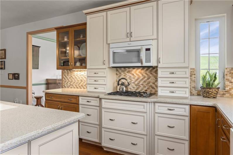 Solid surface countertop and dove-tailed cabinetry.
