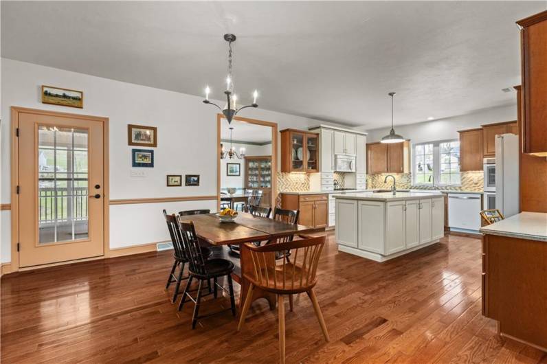Plenty of room off the kitchen for an extra dining area with access to the outdoor deck.