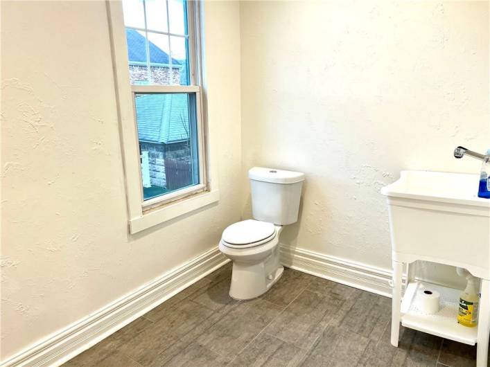Powder Room on Main Level with Laundry Area too!