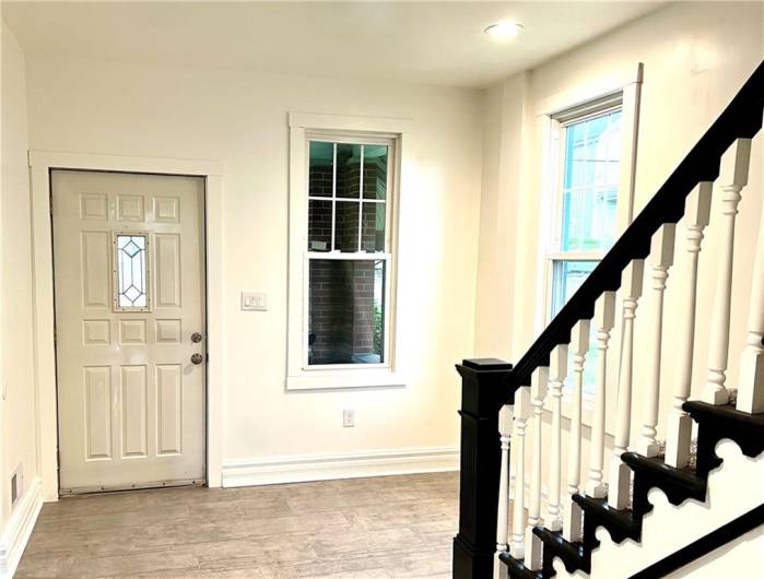 Large Foyer with two Windows.