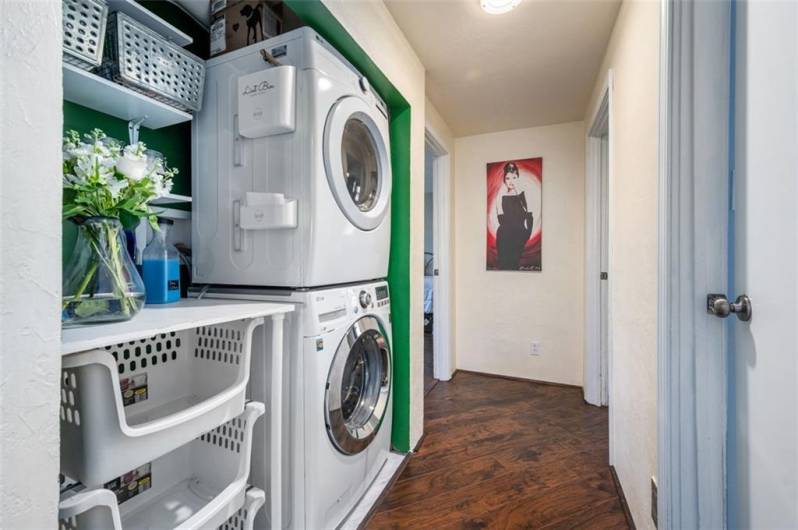 Looking for a first-floor laundry...here it is? The washer and dryer are staying with this home, along with all of the kitchen appliances, too.