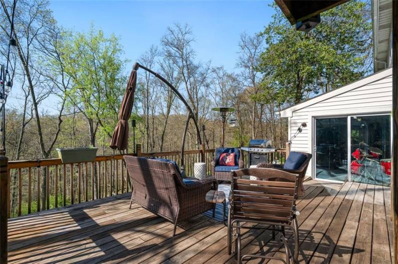 Enjoy the outdoor living space on this over-sized two-tiered deck and private back yard. Let the Spring and Summer barbecue cooking begin!  Easy access to the 
