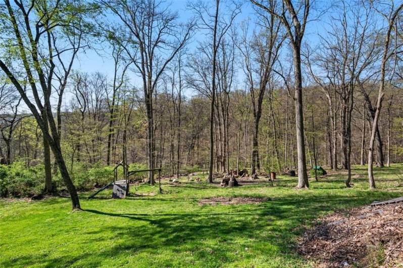 WOW! Mother Nature! Space, privacy...ENJOY! Yes, this is your property...over one acre plus of land! But close to everything you need and want.