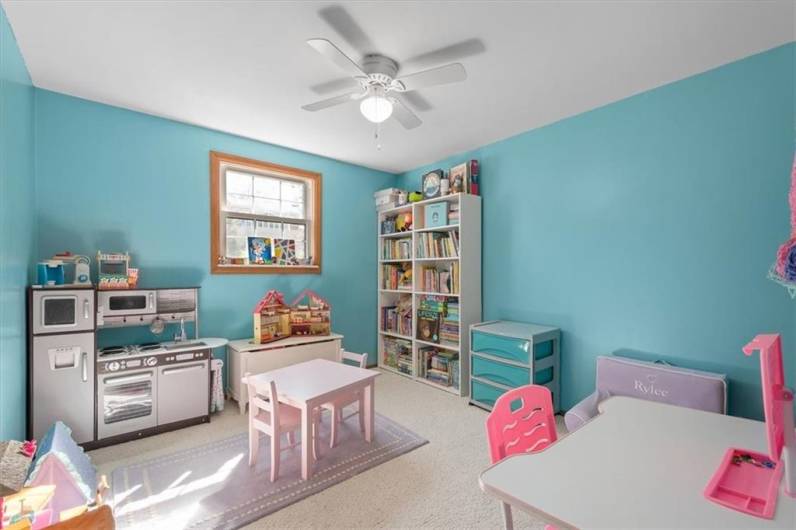 This bedroom is currently being used as the girls play room but is still a great sized bedroom with ample closet space.