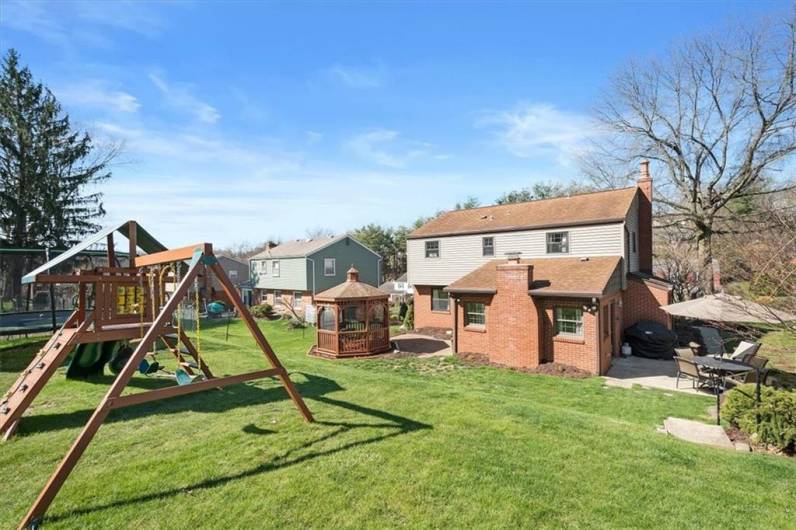 Perfect yard for a play structure and Trampoline