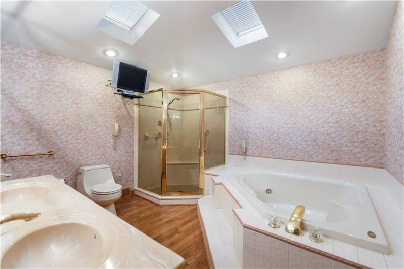 Full Bath on Main Level offers Garden Tub and Walk In Shower