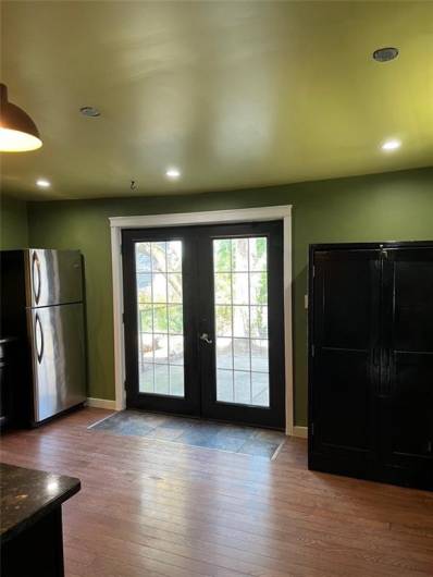 French doors from kitchen to back yard