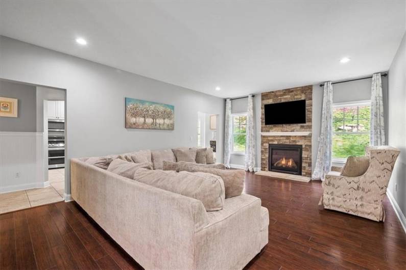 Large gathering family room with gas fireplace