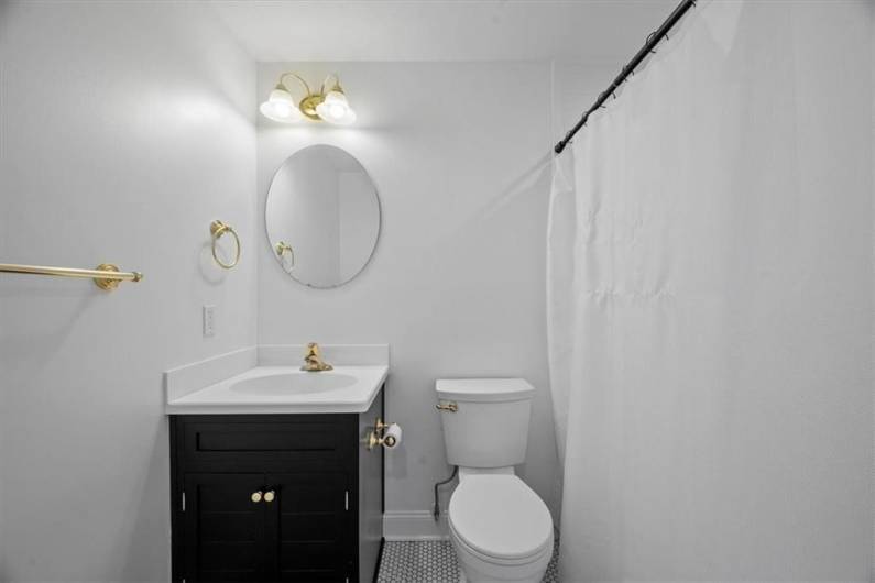 Full Bathroom attached to Bedroom 6
