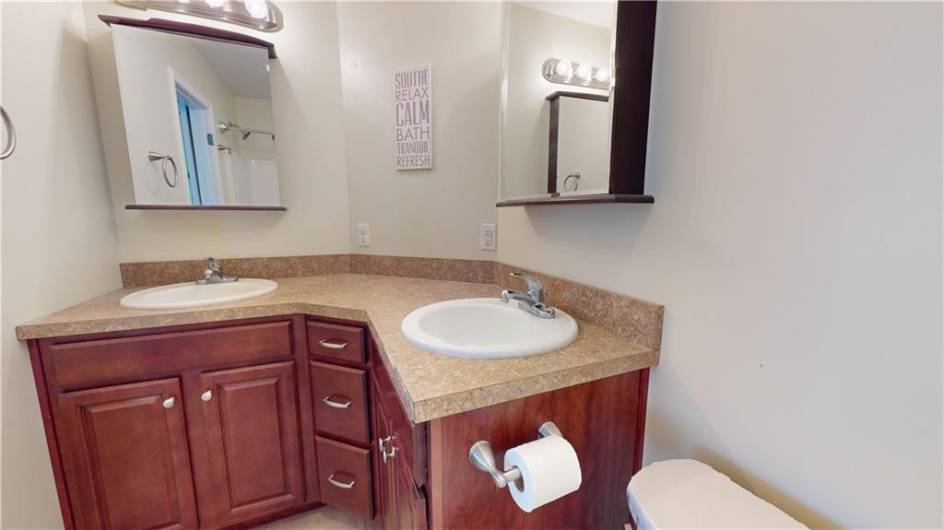 Double sink vanity makes getting ready for the day a little easier.