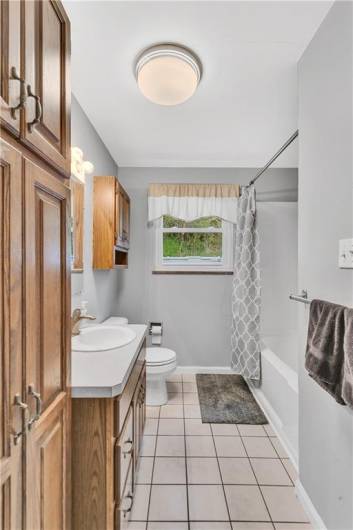 There's plenty of storage throughout this home - the bathroom is no exception.
