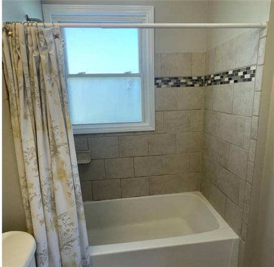 Beautiful tile with glass tile accents, ceramic tile floor