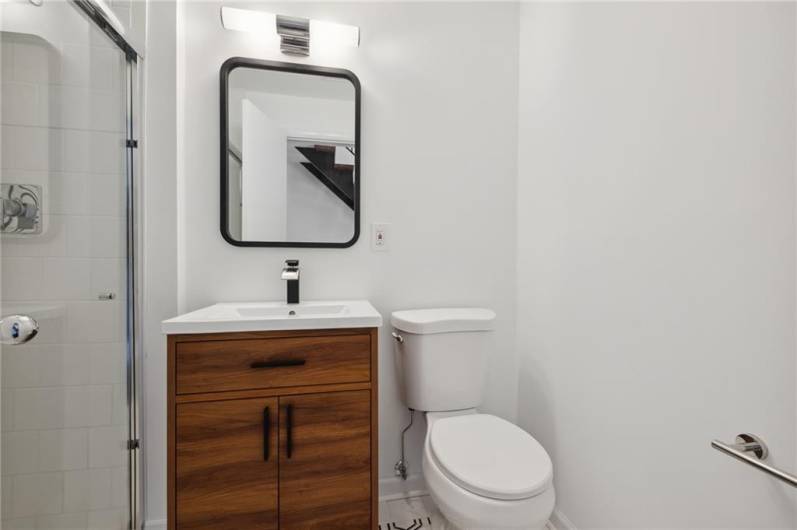 Located on the main living level, you'll find this thoughtfully designed full bathroom.