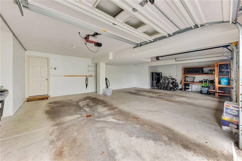 An oversized two car garage will accommodate the SUVs and still have room for storing bikes and supplies.