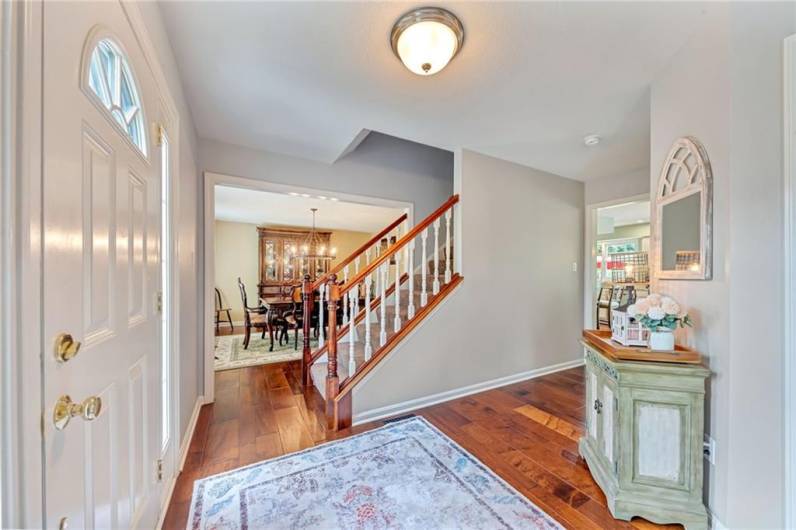 Greet your guests in the hardwood floored foyer with coat closet.