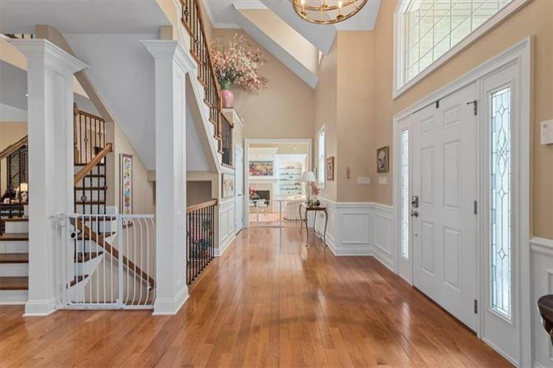 The home offers beautiful accent moldings and gleaming hardwood flooring on the main level.