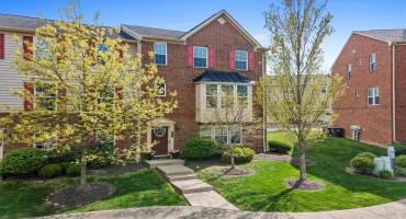 Charming Brick-Front End Unit Townhome: A Perfect Blend of Elegance and Comfort