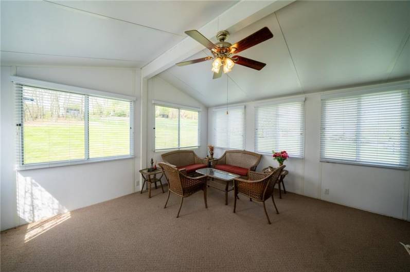 Vaulted Sun Room with Fan and Plenty of Windows