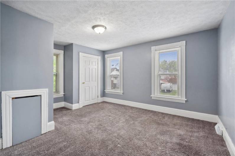 Great size owner's suite with updated vinyl windows and new carpet. Fresh paint throughout!
