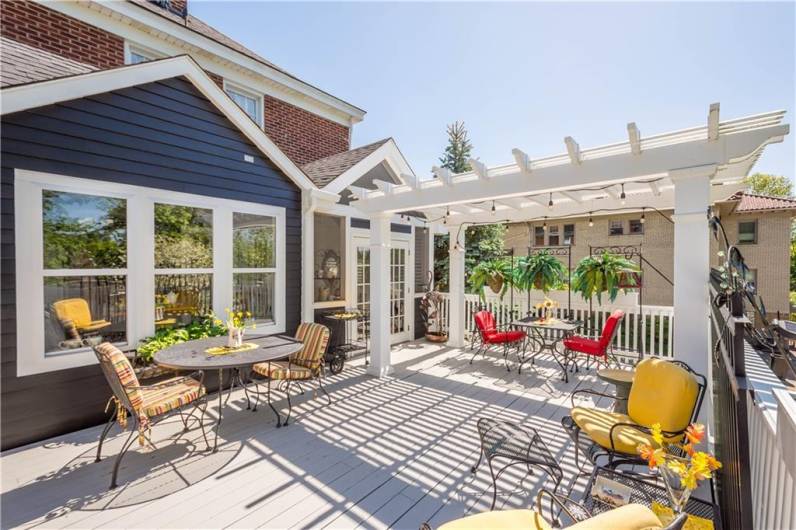Off the sunroom you can easily access the large deck with pergola. Imagine summer entertaining in this space!