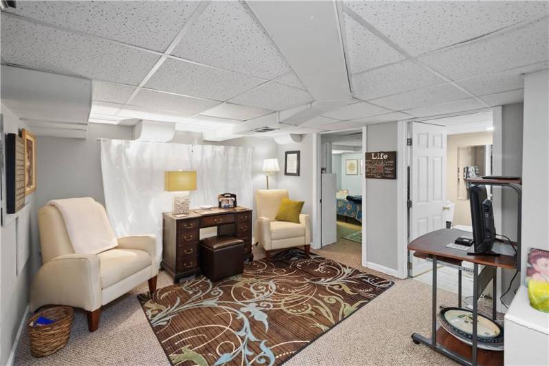 The lower level game room is a nice additional space for guests or a playroom for the kids.
