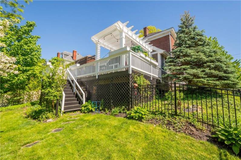The outdoor space this home offers is truly amazing from the patios and deck to the fenced yard with plenty of room for playing or a garden.