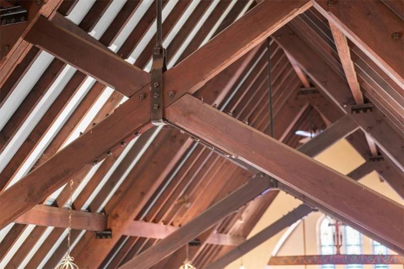 Beautiful Beams line the ceiling from front to back.