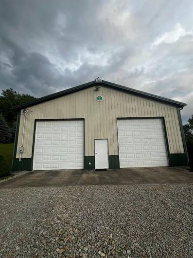 Garage with 3 12' x 12' automatic garage doors
