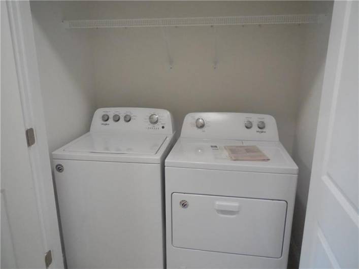 Laundry closet in owner's suite on main.