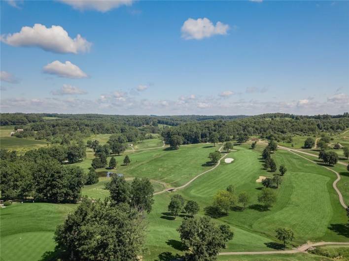 Seven Oaks Country Club golf course is just a few steps from your door.
