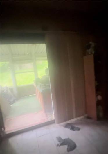 view of enclosed side porch