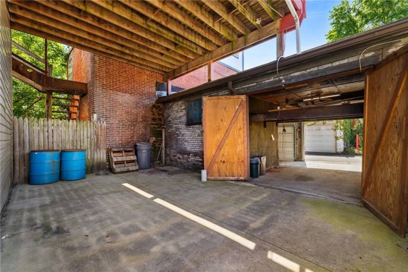 Private Patio leading to detached garage