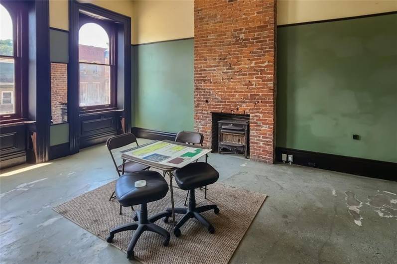 The front 2nd floor office area is currently zoned for office/commercial usage. Other possibilities include AirBNB apartment with approvals or an efficiency apartment.