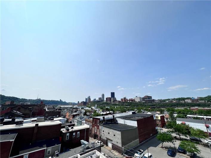 Rooftop with panoramic views of Downtown Pittsburgh and surroundings.