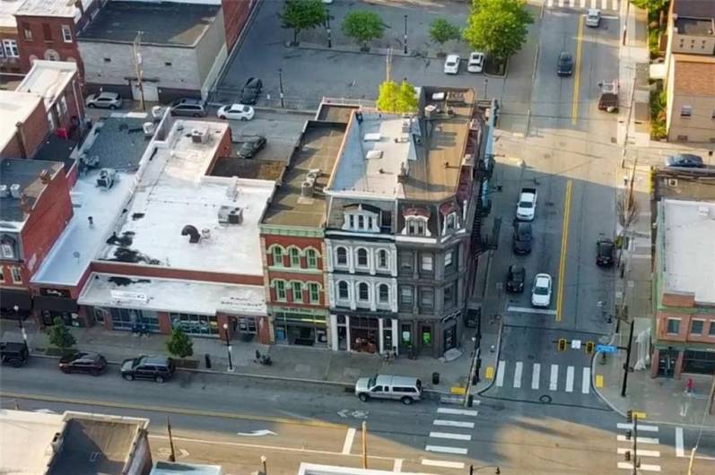 The 2nd building from the right corner of 18th St.