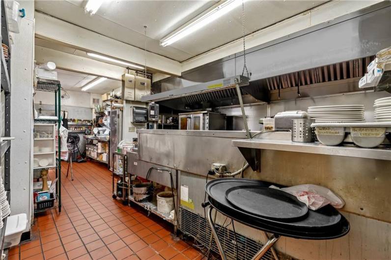 Kitchen area as viewed when entering from the corner of the bar