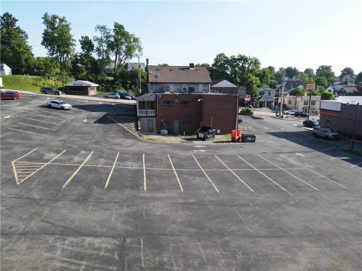 View of rear of building and rear parking area.  The asphault parking lot is in great shape and maintained.