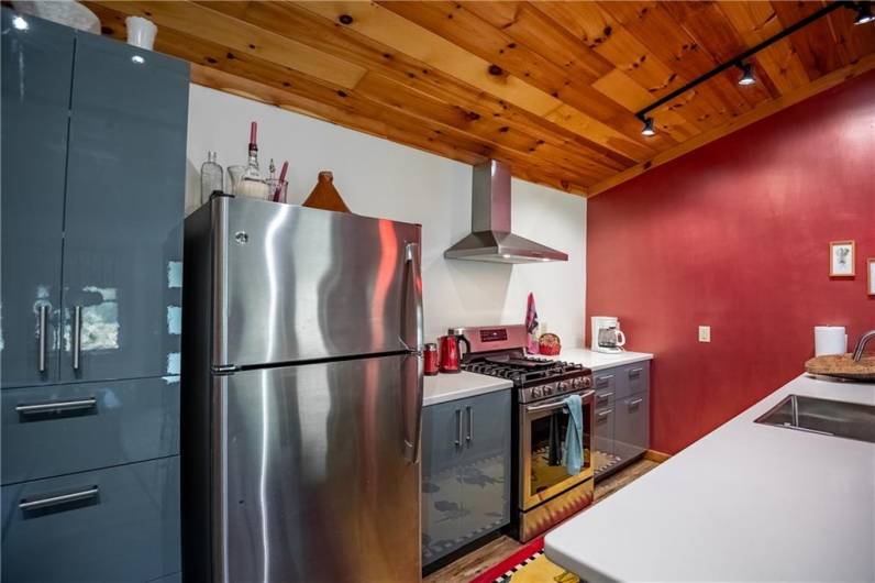 Kitchen, propane gas stove, stainless refrigerator