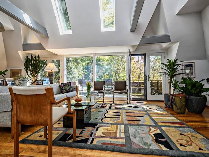 Other view of great room leading to deck