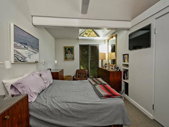 Large second floor bedroom with closet