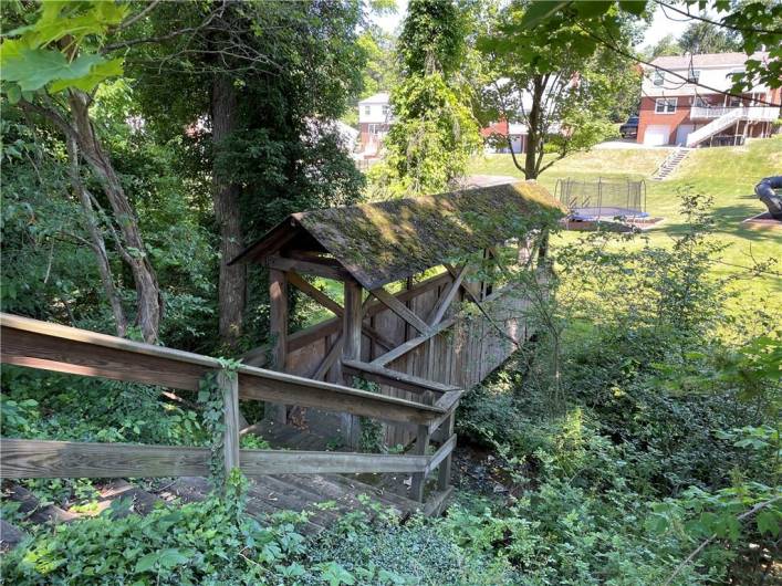 Covered Bridge Over Stream