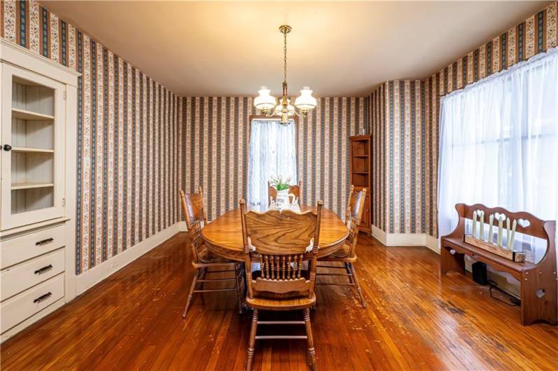 Formal dining room with lots of natural light.