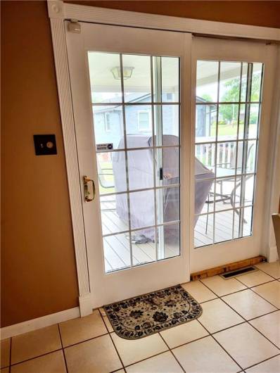 Sliding glass door in dining/kitchen area