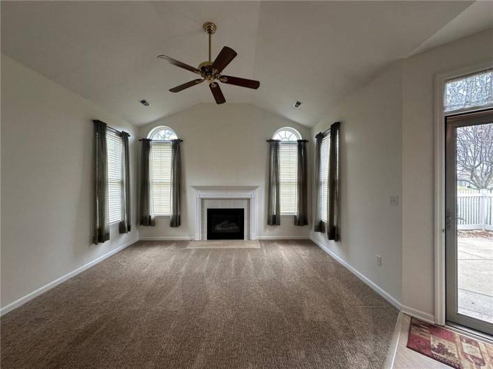 Vaulted ceiling with fan, new carpet, gas fireplace! Front door entry has new LVT flooring!