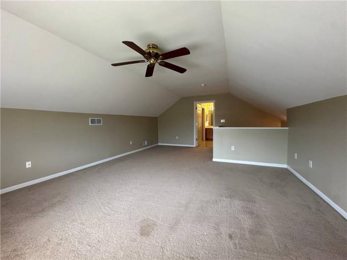 Spacious 2nd Floor Owner's Suite offering ceiling fan, walk-in closet and private full bath.