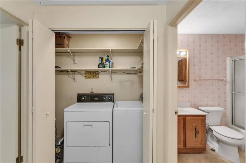 Access to washer and dryer between bedroom and bathroom