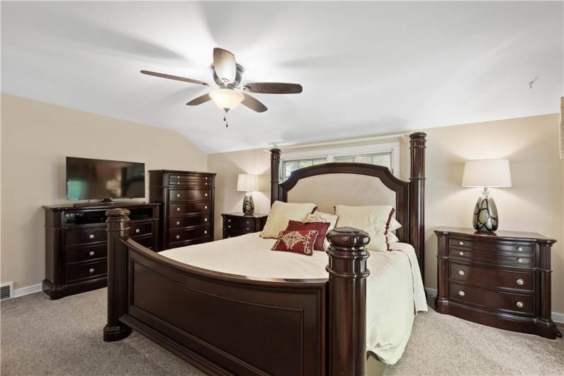 Fit for a king size bed and oversized furniture, this room features two large closets.
